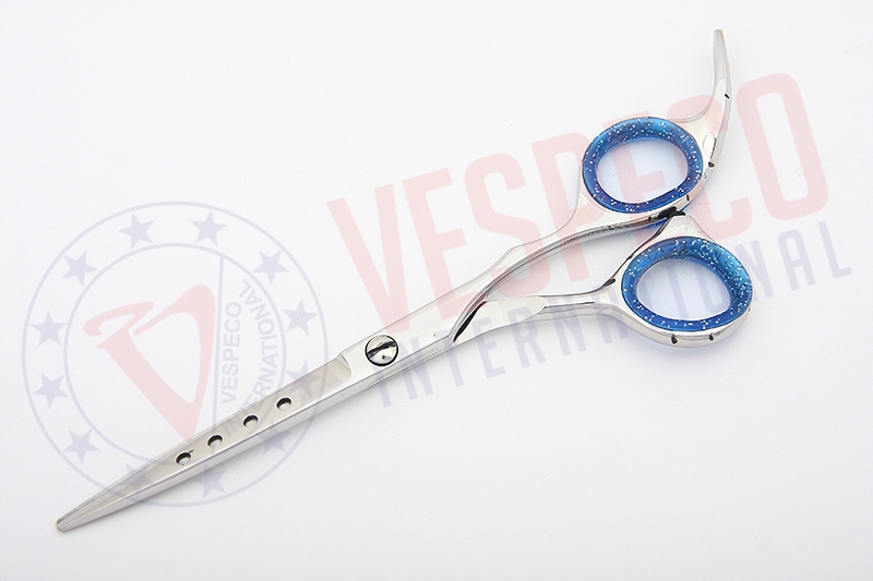 Scissors with holes
